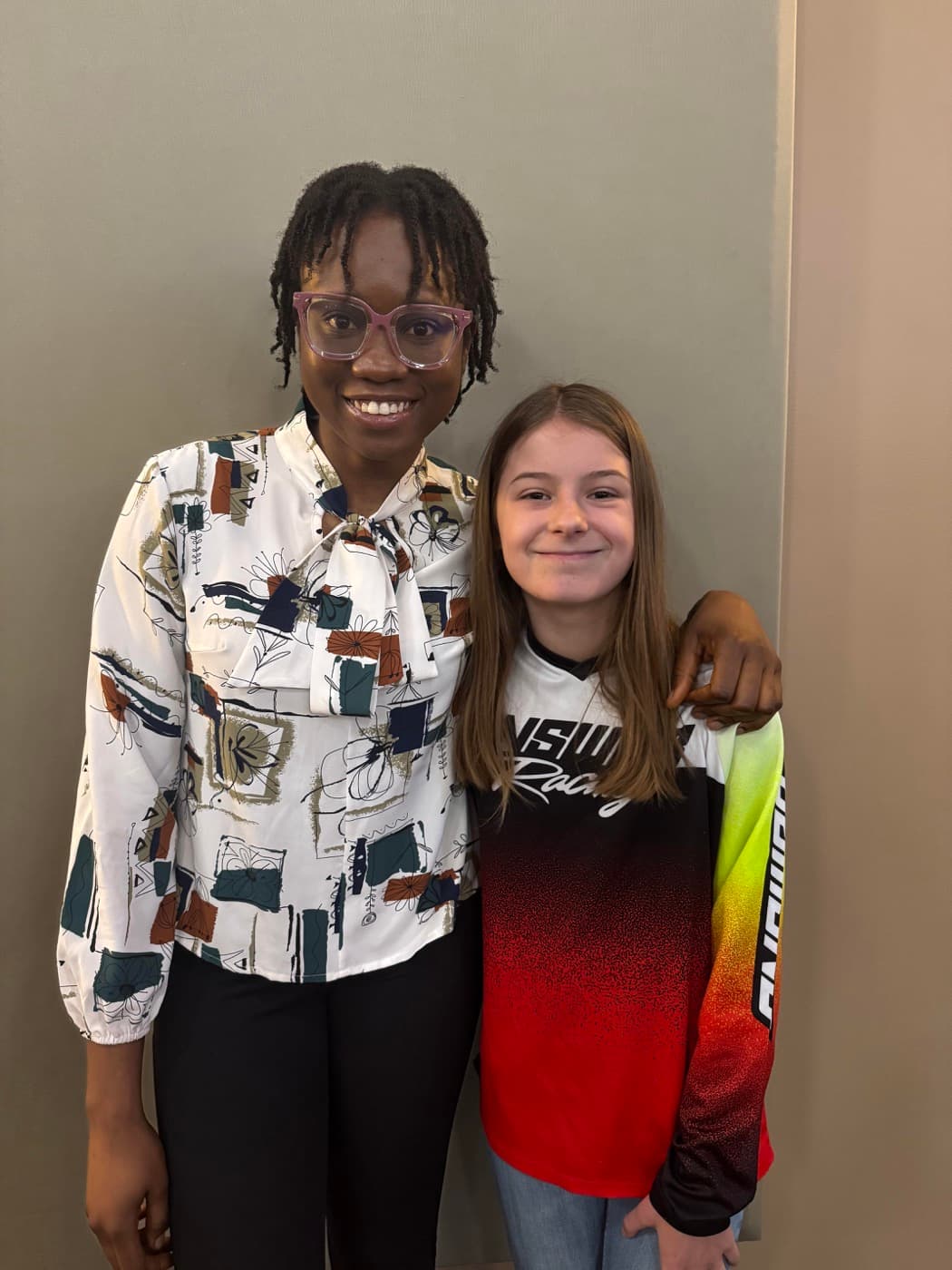 Two friends smiling together